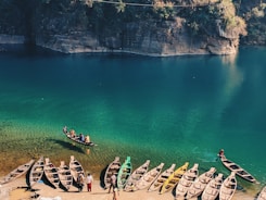 landscape photo of boats near body of water