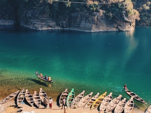 landscape photo of boats near body of water