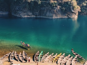landscape photo of boats near body of water
