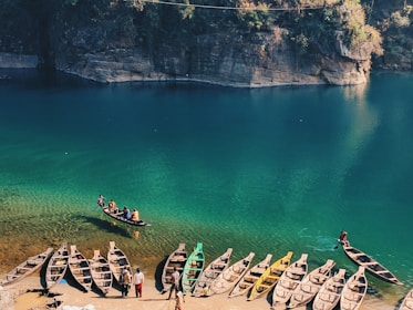 landscape photo of boats near body of water