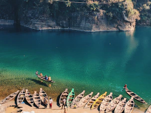 landscape photo of boats near body of water