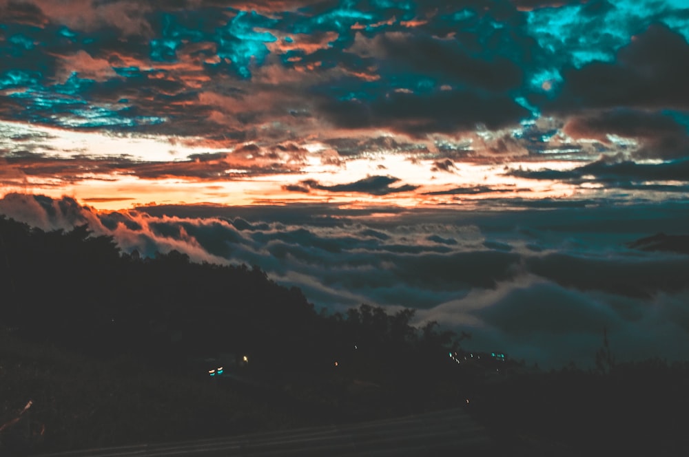 top view of mountain covered by clouds