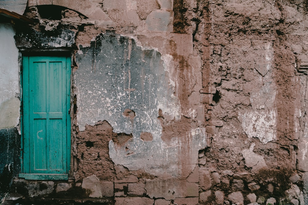 blue wooden 4-panel door