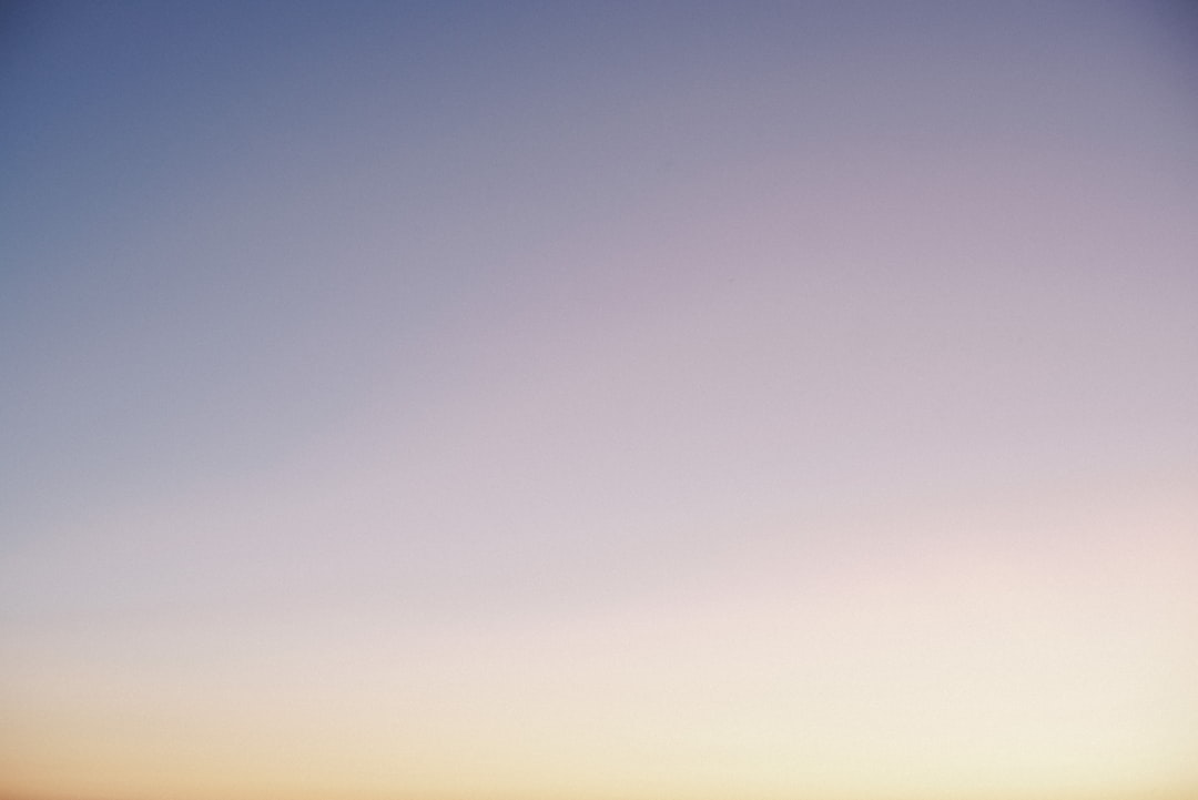 photography of white sky at golden hour