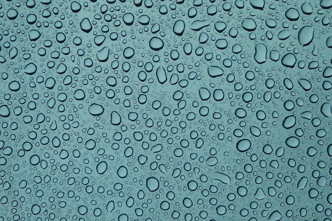 I’d just had a new conservatory built and the glass in the roof was what they call self-cleaning.  After a heavy rain shower, I looked up to see all the droplets of water beading and thought it made for an interesting photo.