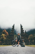 man sitting on dirtbike