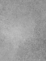 a black and white photo of a concrete wall
