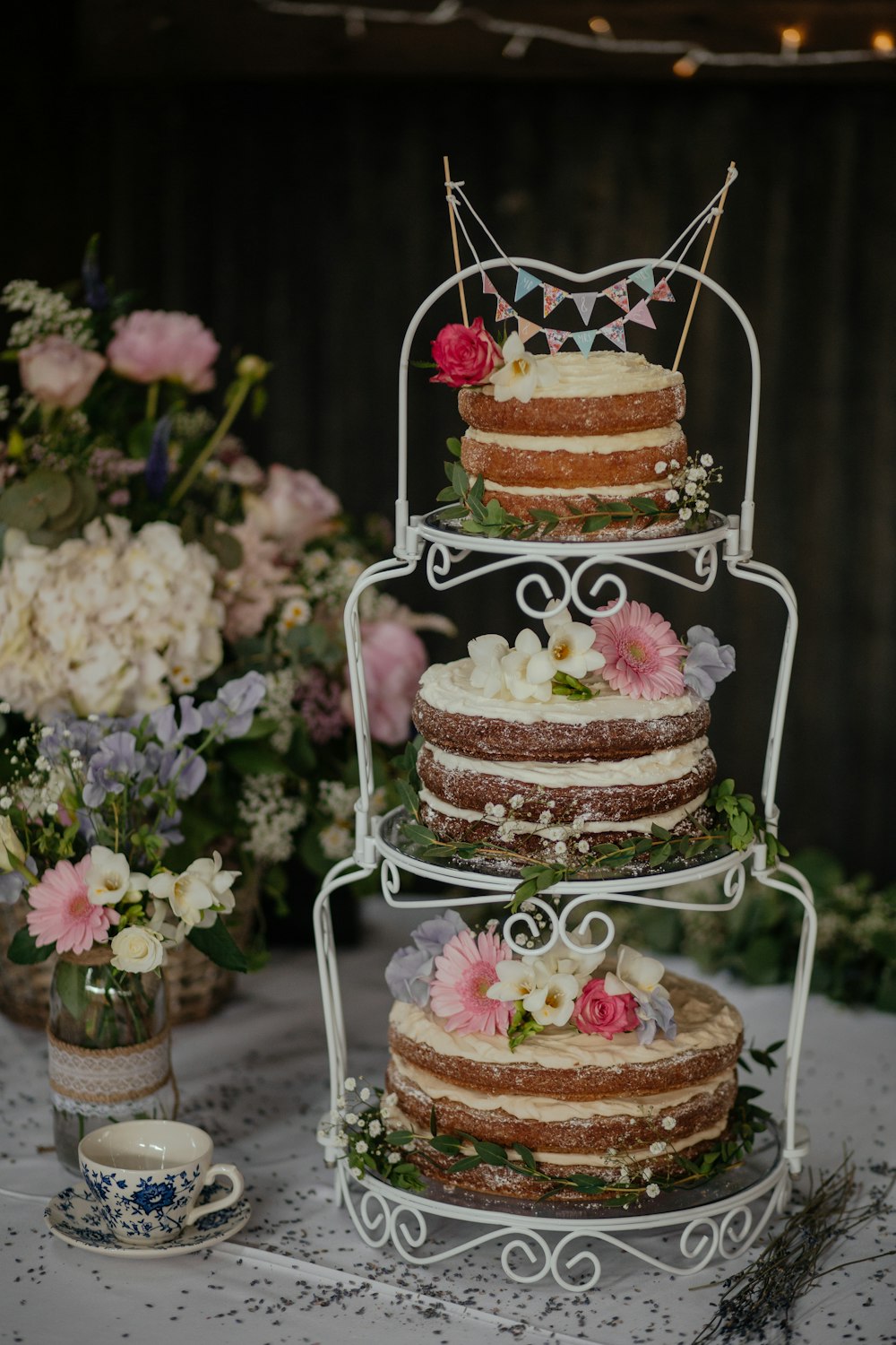 three cakes on white wire cake rack