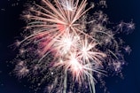 time lapse photography of fireworks at night
