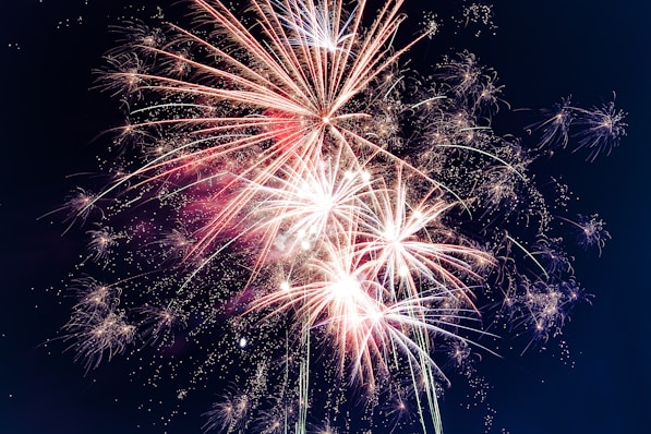 time lapse photography of fireworks at night