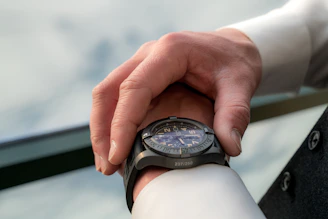 person looking at watch