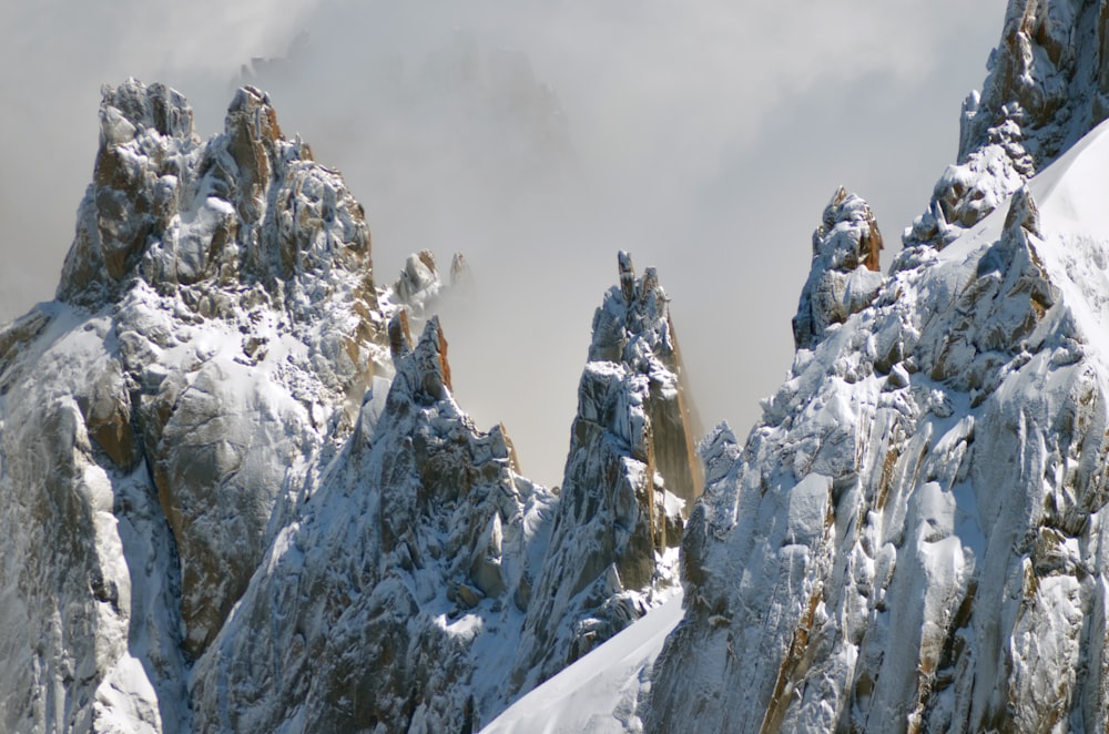 mountain coated with snow