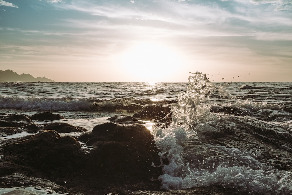 a large body of water surrounded by rocks