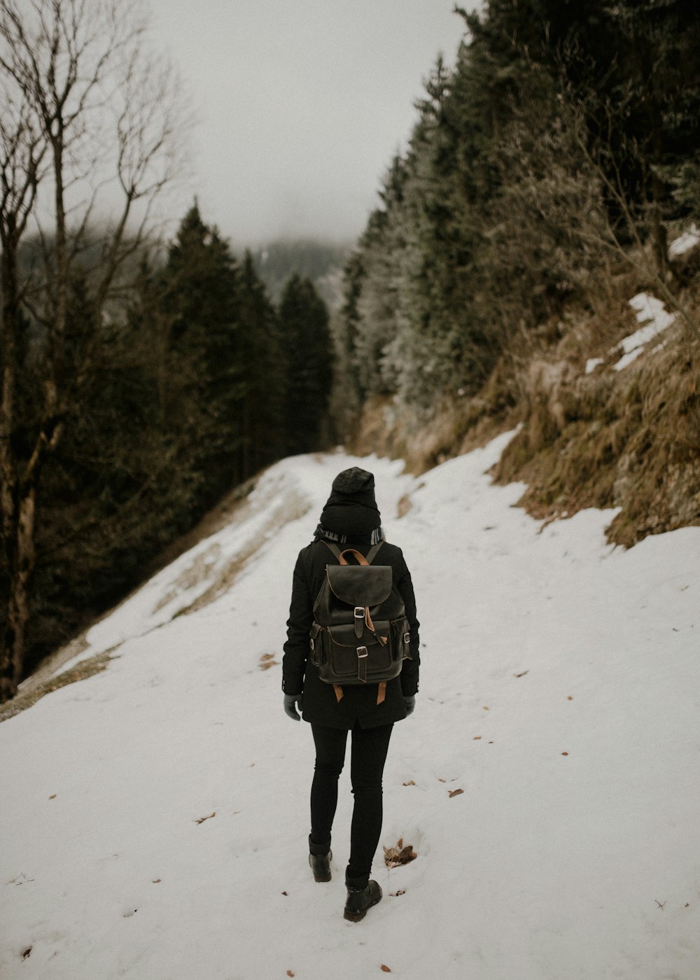 woman walking on snow