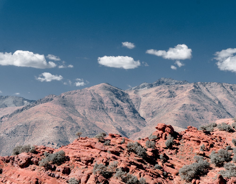 brown rocky mountain under blue sky during daytime