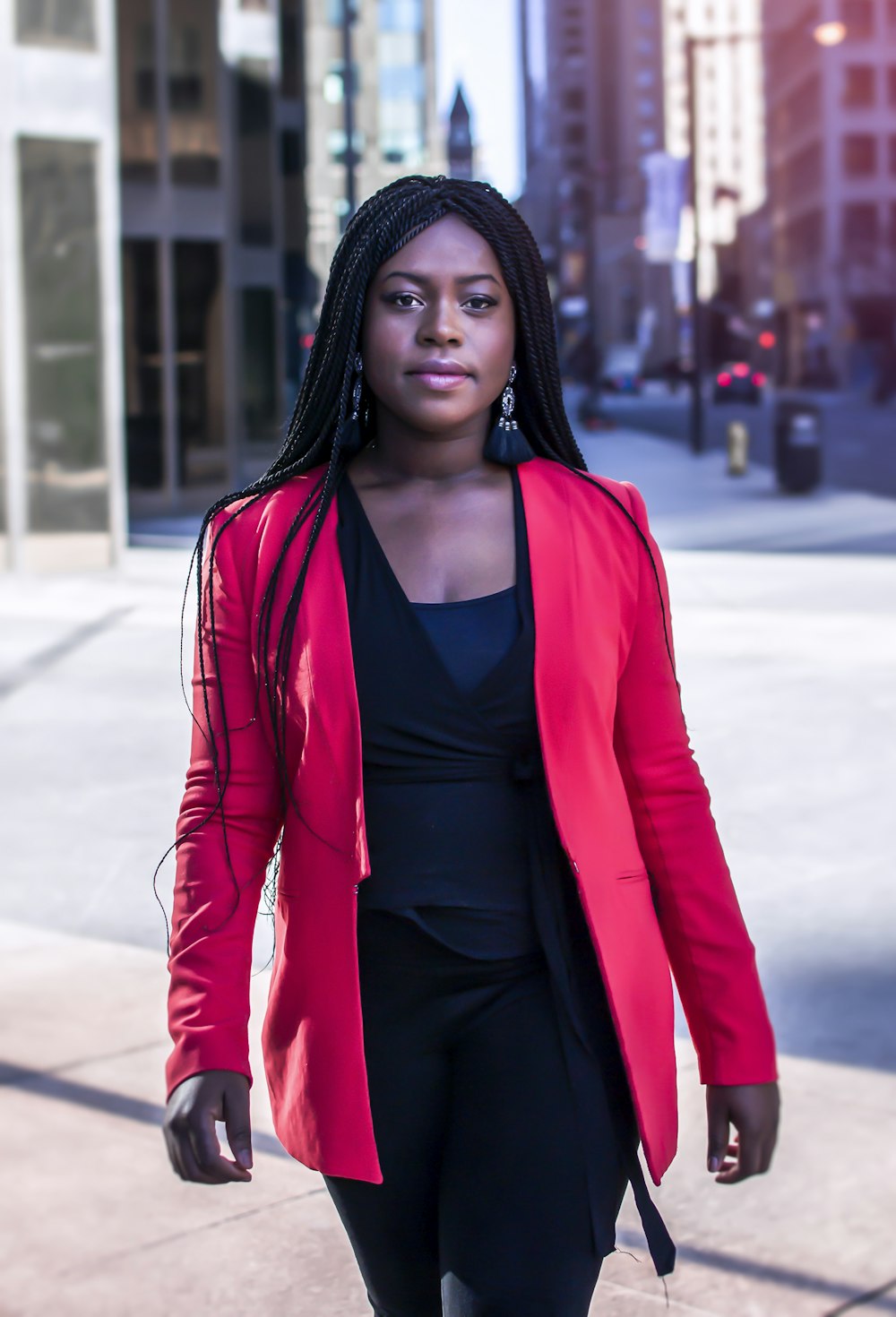 woman walking near city