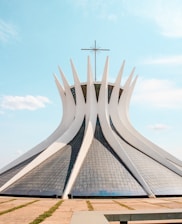 white and gray concrete structure under blue sky during daytime