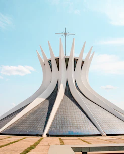 white and gray concrete structure under blue sky during daytime
