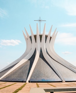 white and gray concrete structure under blue sky during daytime