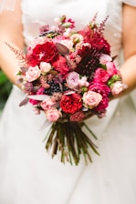 bride holding flower bouquet