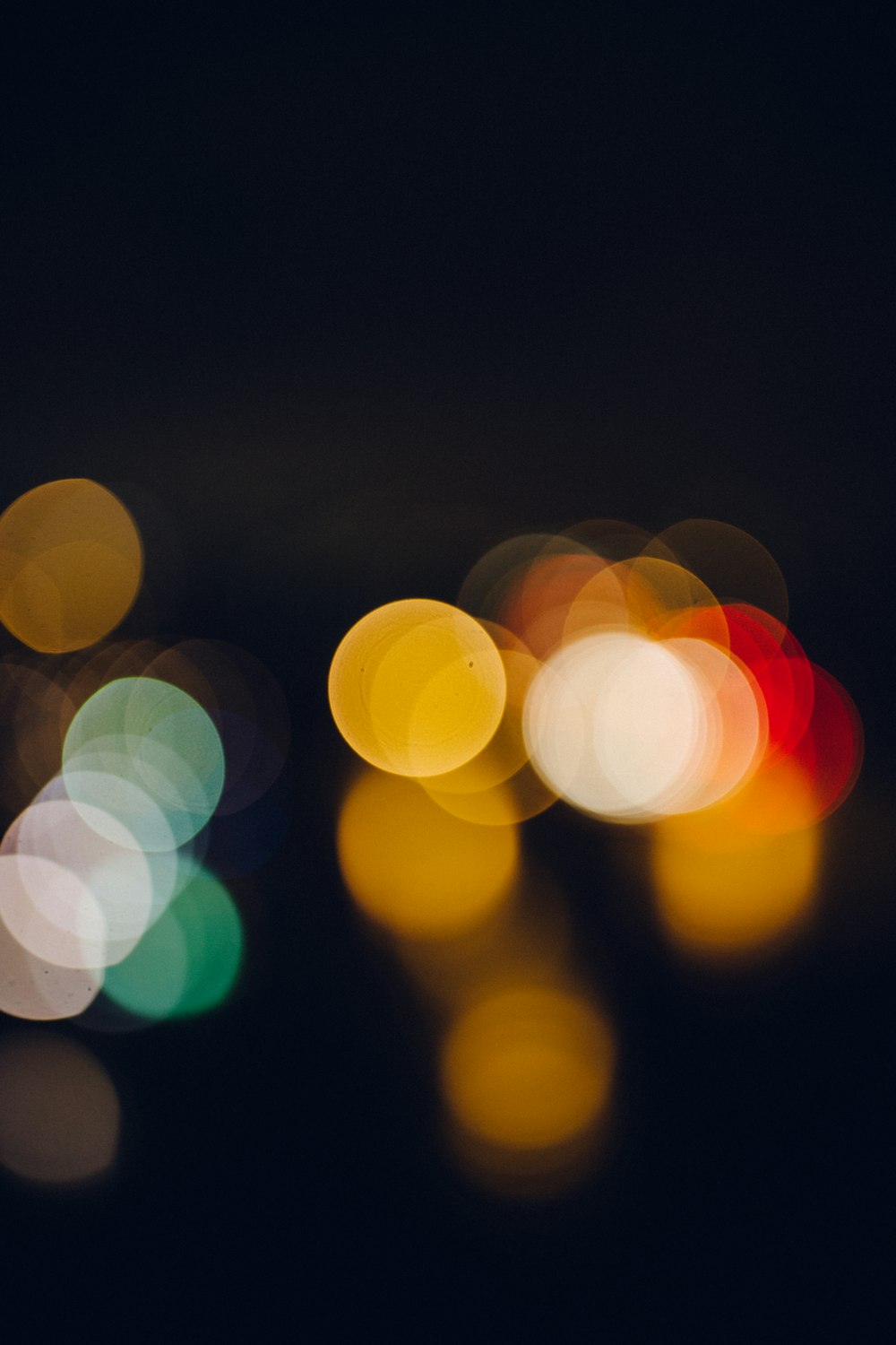 a blurry photo of a city street at night