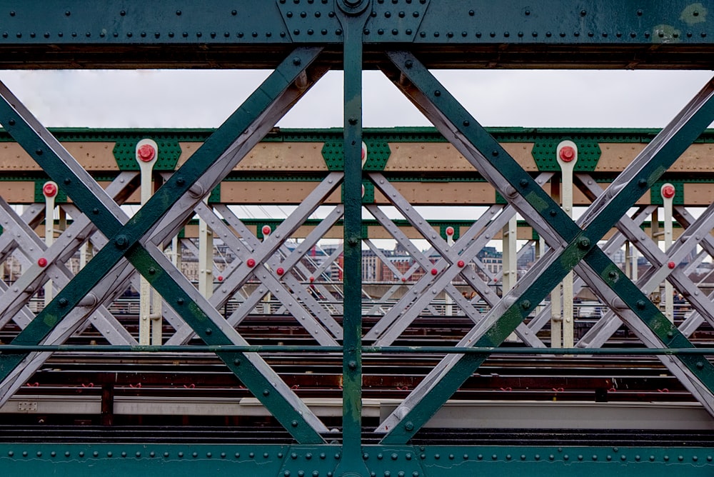 photography of green and white metal structures