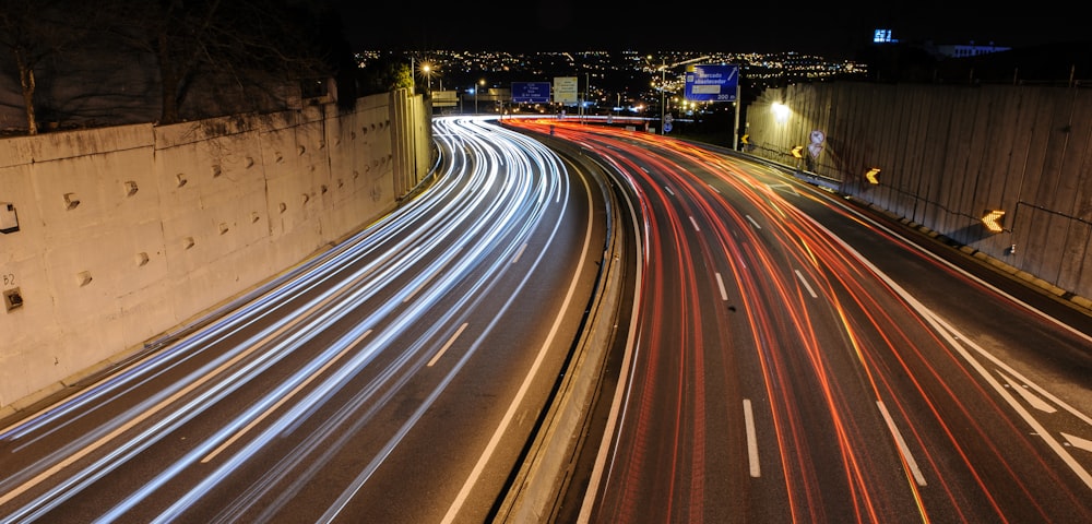 time lapse photography of cars on road during night time