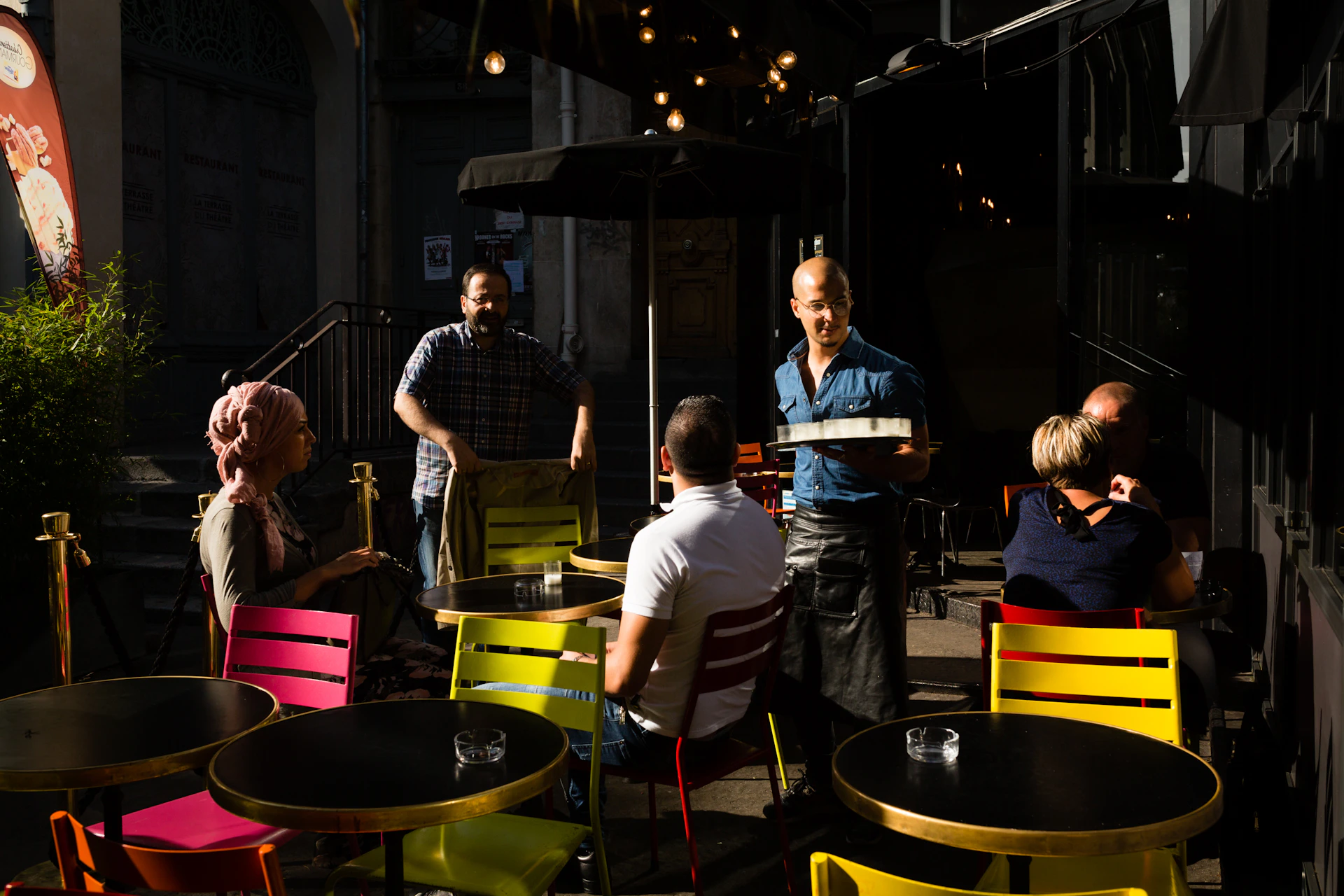 woman wearing yellow long-sleeved dress under white clouds and blue sky during daytime