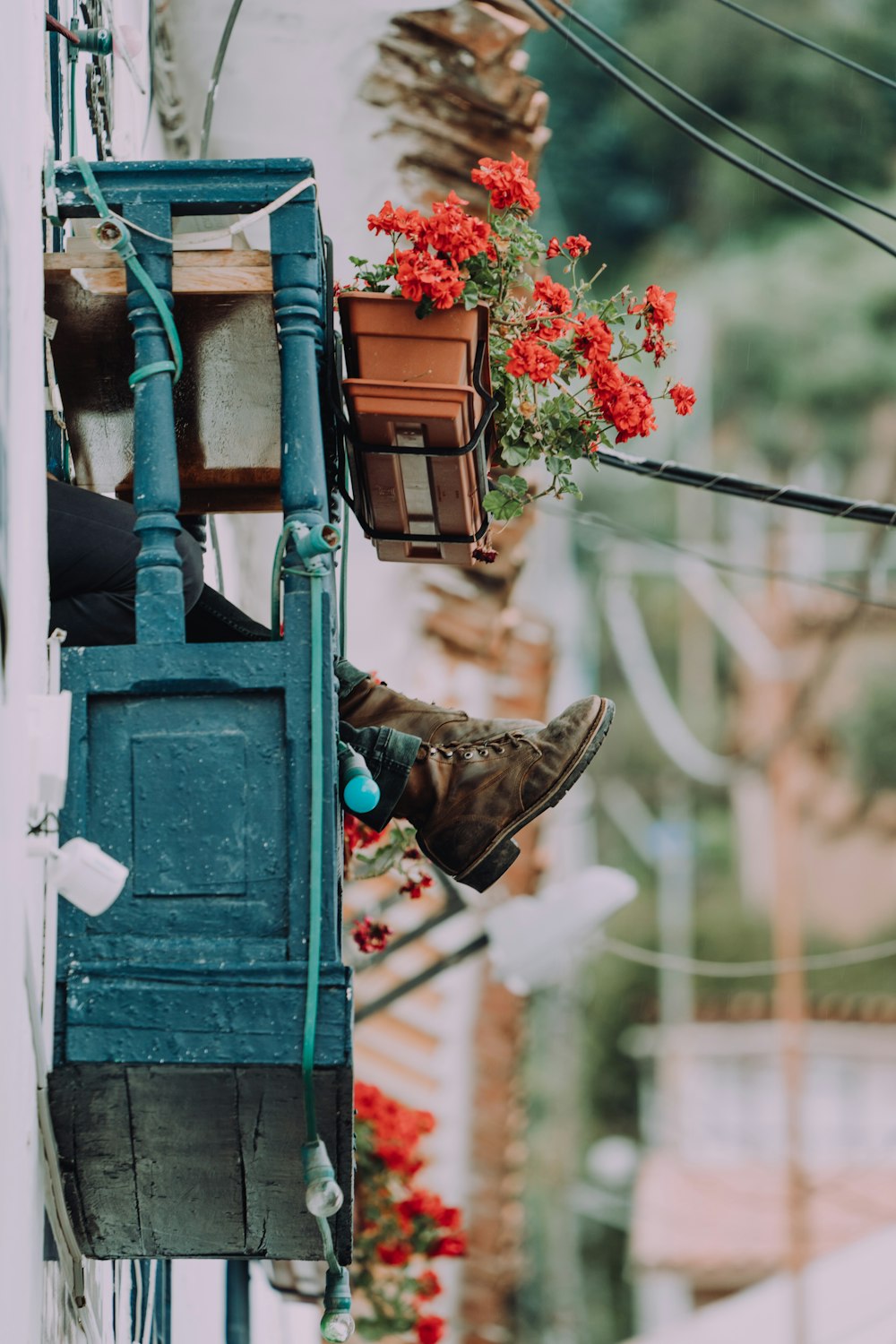 person sitting on balcony