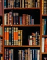 assorted-title of books piled in the shelves