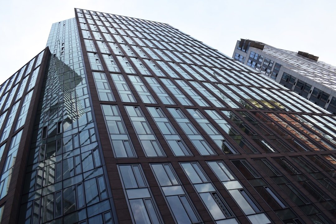 black glass walled high rise building