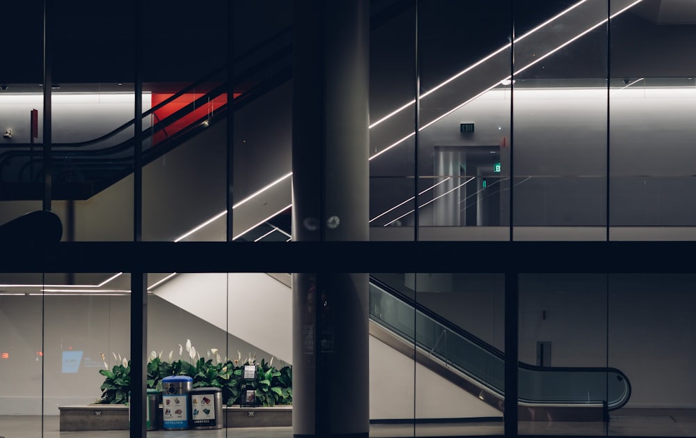 white and black building escalator