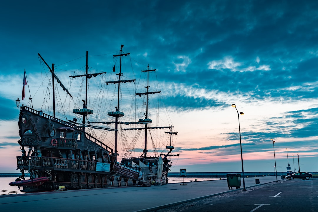 brown galleon ship on deck, Pirates Ship in the Gdynia Harbour at sunrise.