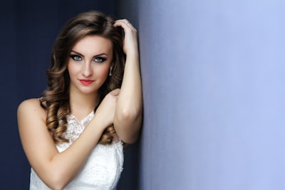 woman leaning on wall bride google meet background