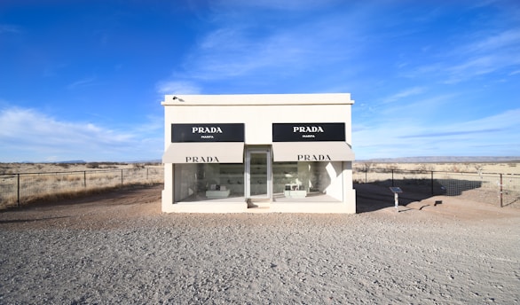 white Prada store facade in middle of nowhere