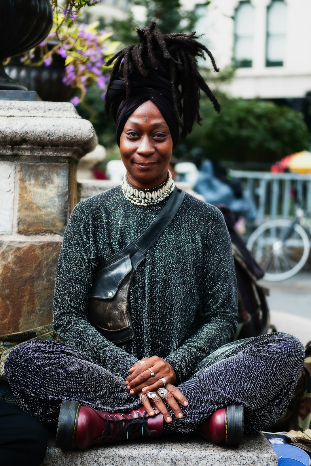 person sitting on gray surface