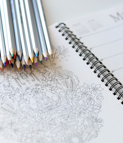 coloring pencils on notebook