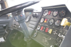 A close-up of a truck dashboard displaying the Wild Bull ELD device in use.