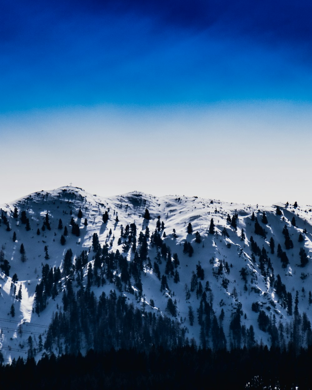 snow capped mountain under blue sky during daytime