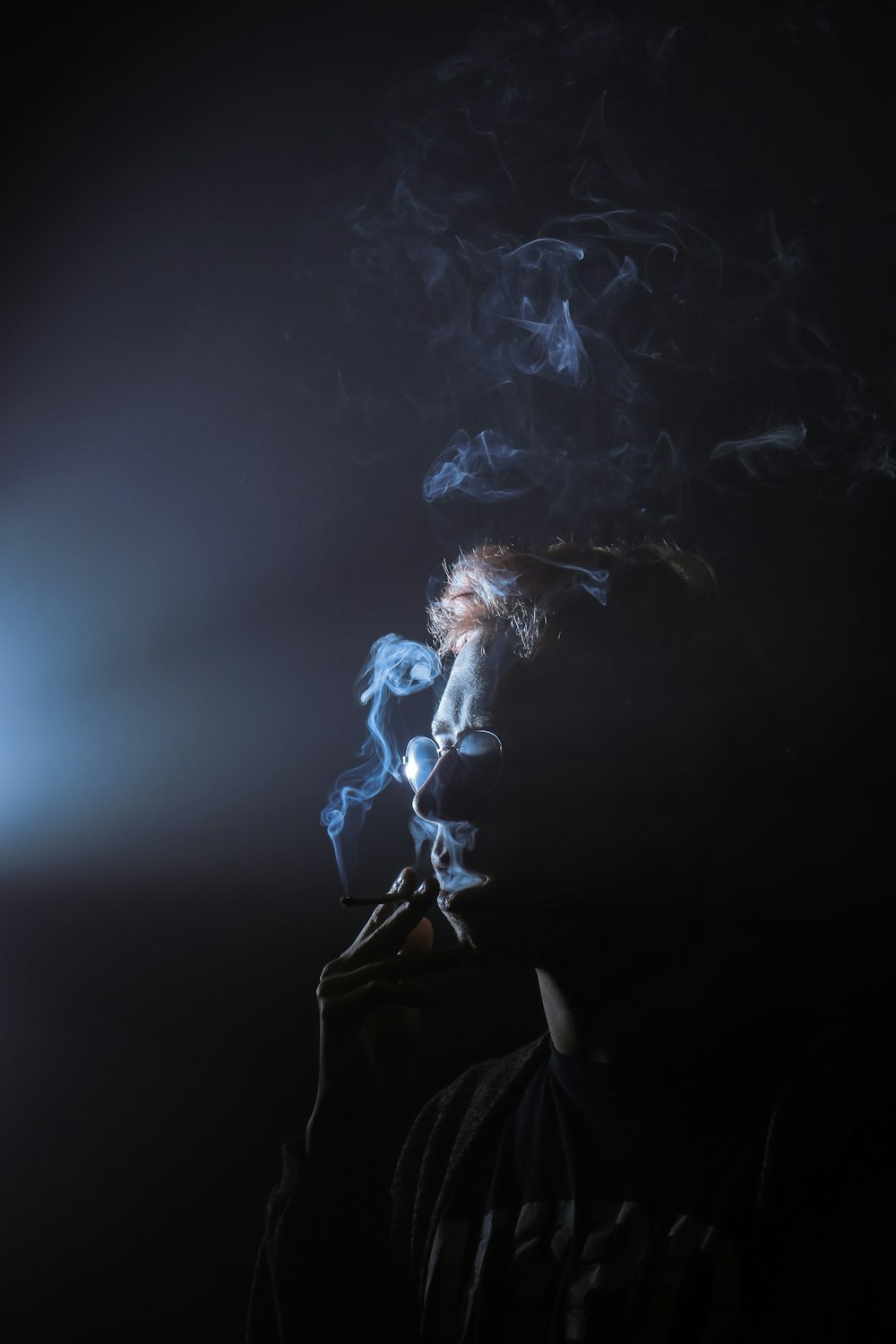 silhouette of smoking man