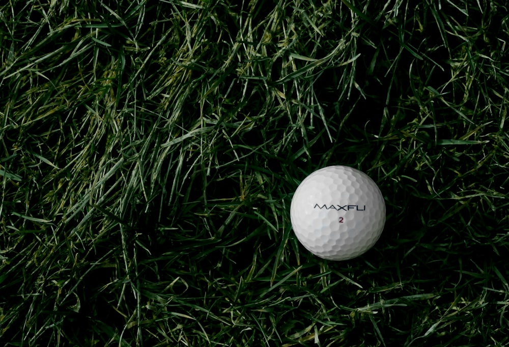 white Maxfu 2 golf ball on green grass