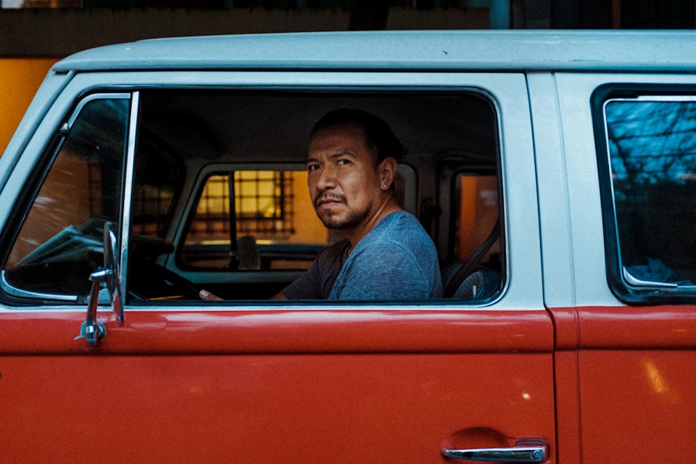 man driving inside the car