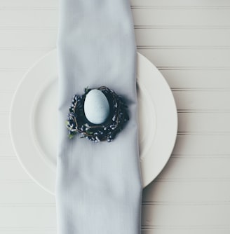 white egg on black plate