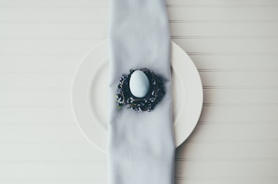 white egg on black plate easter google meet background