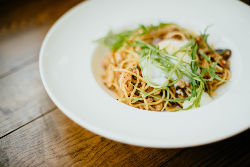 cooked dish on ceramic plate