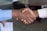 two person handshaking