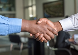 two people shaking hands