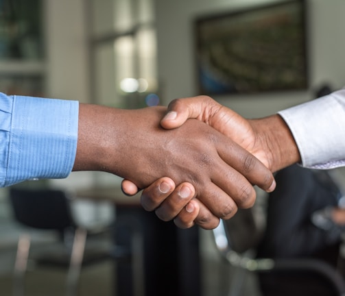 two people shaking hands