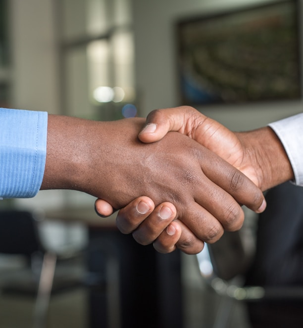 two people shaking hands