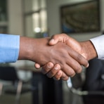 two people shaking hands